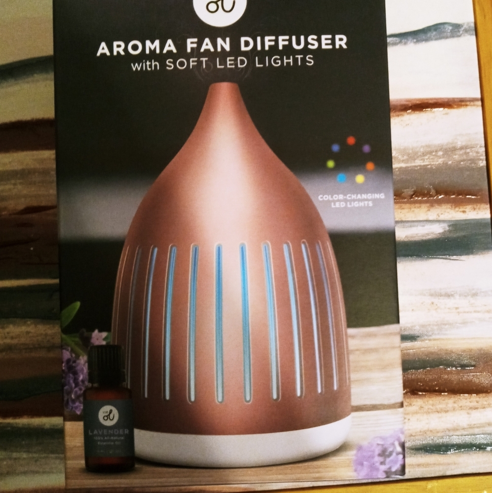 Essential oil diffuser w/ lights. Rose gold color